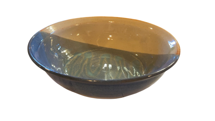 Bowl Glossy blue with hints of brown and yellow inside