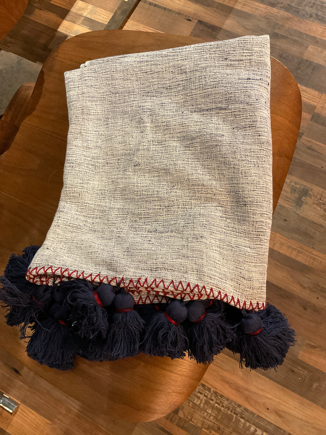 Wooven hand woven throw w/blue tassels