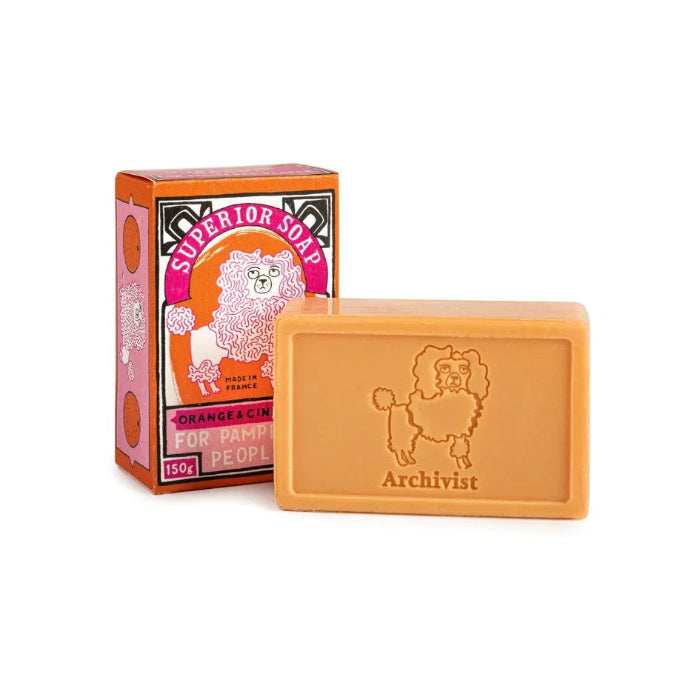 Bar of soap with a box labeled 'Superior Soap' on a white background