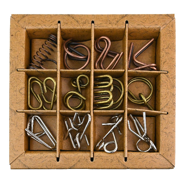 Set of metal paper clips in a wooden box with compartments.