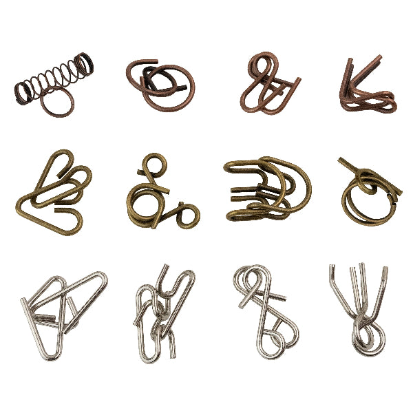 Collection of various metal paperclips on a white background