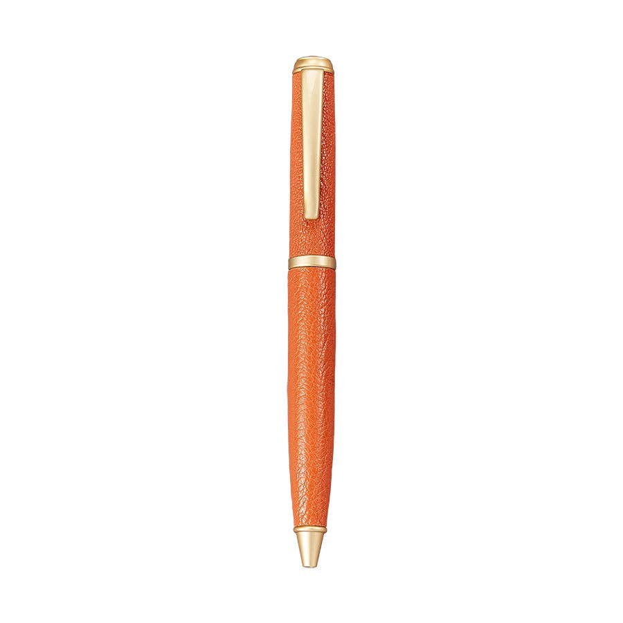 Orange pen with gold accents on a white background