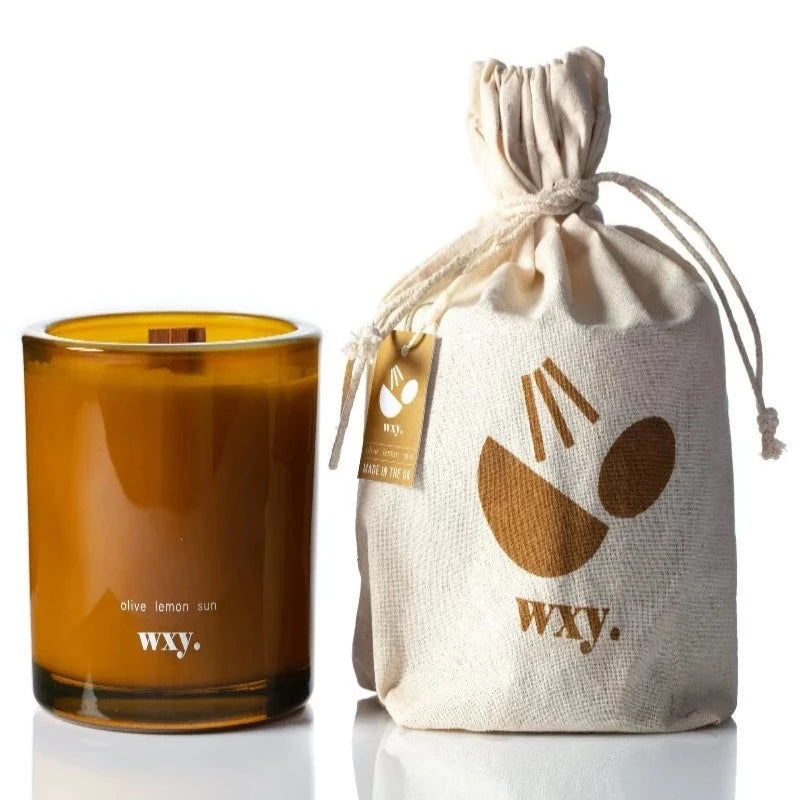 wxy. Large Amber Candle | Olive, Lemon + Sun